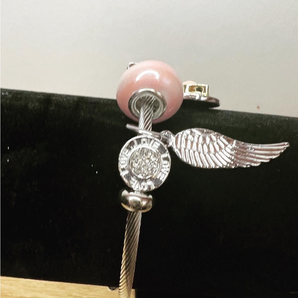 Pink charmed Clasp bracelet brand new
